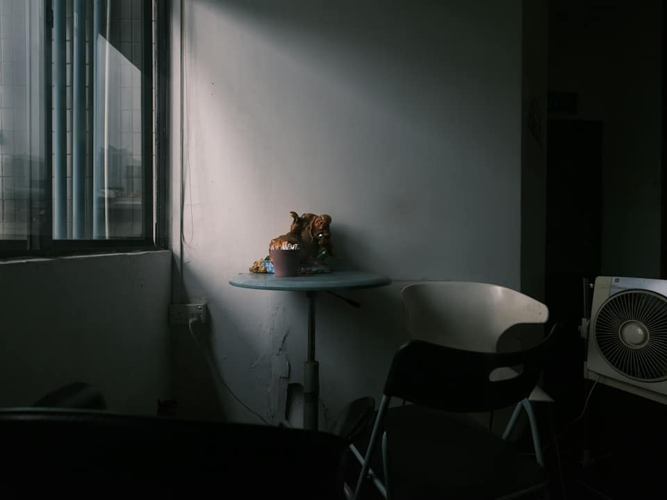White table near window during daytime