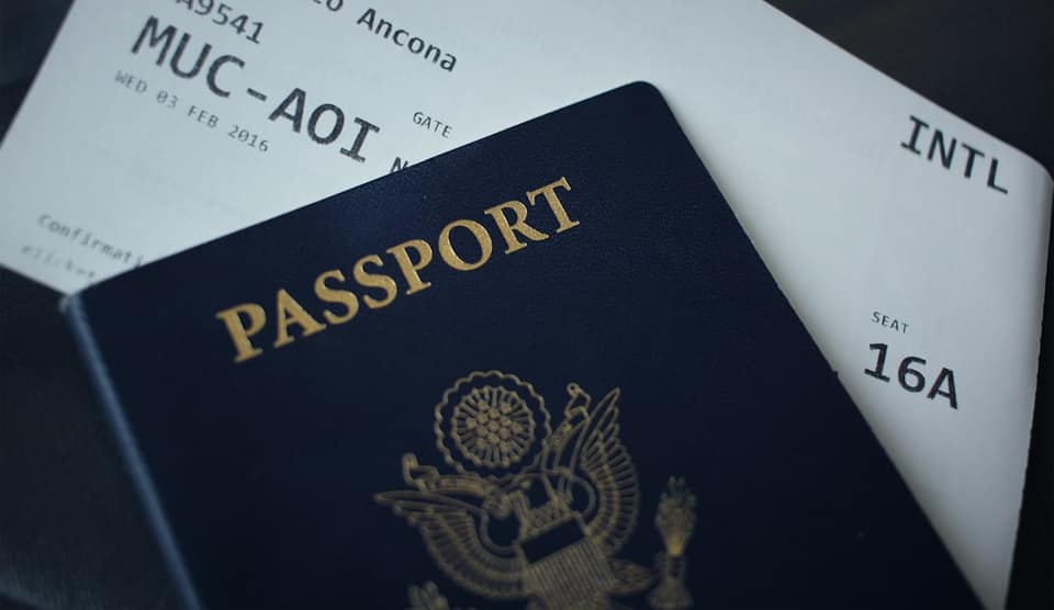Passport booklet on top of white paper